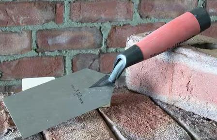 Rental store for MARGIN TROWEL, 5 X2 , DURASOFT HANDLE in Marquette MI